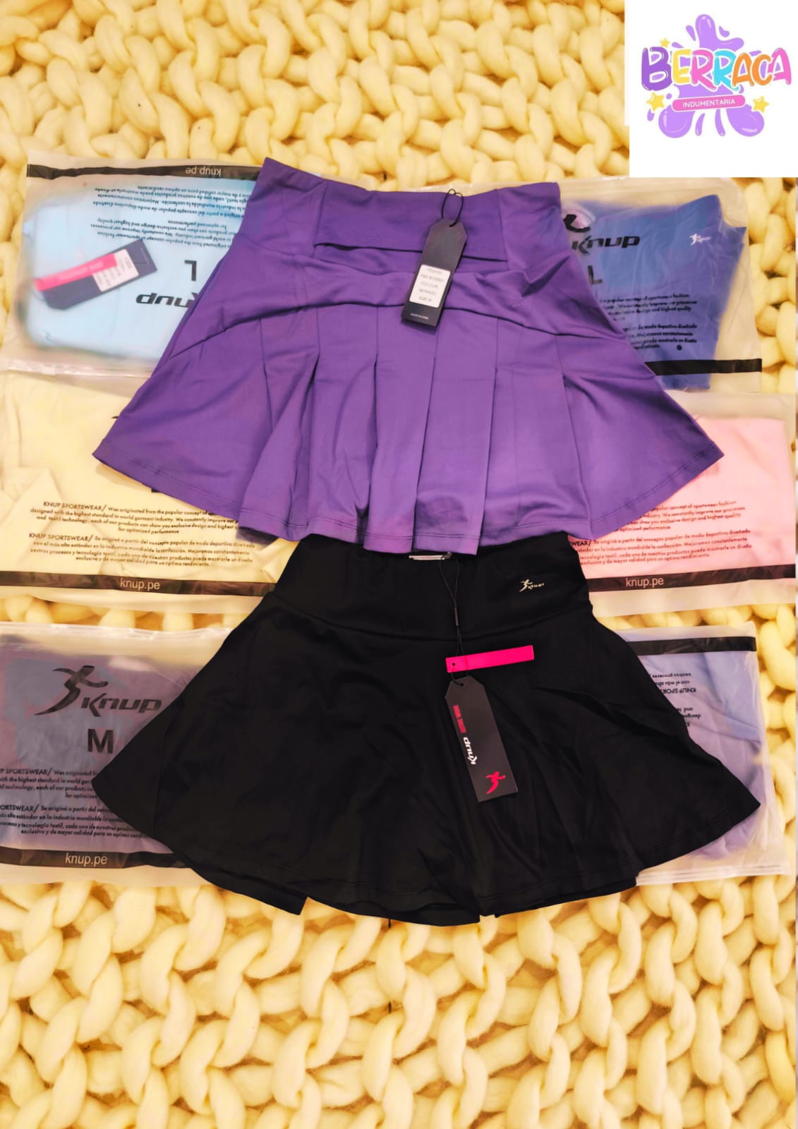 POLLERA CORTA CON BOLSILLO  MARCA KNUP